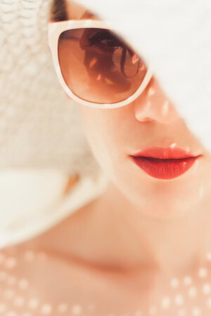 Irvine lip augmentation model with sunglasses