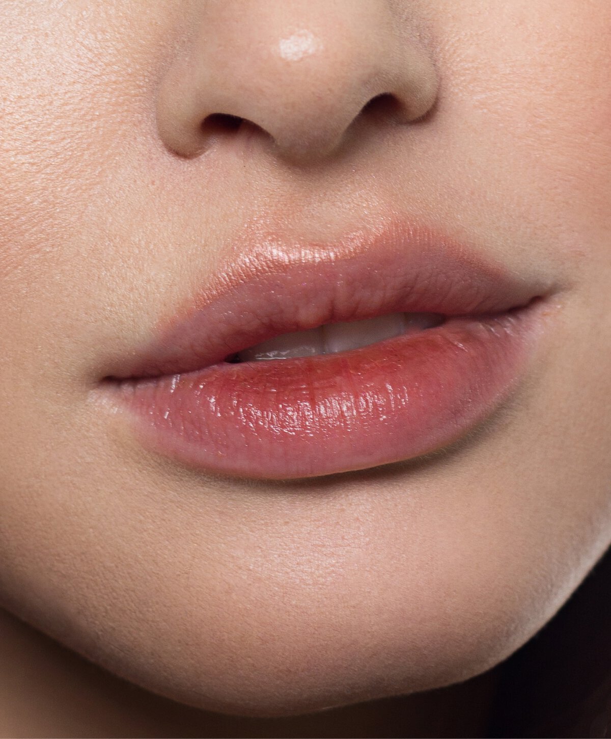 Irvine lip flip model wearing red lipstick